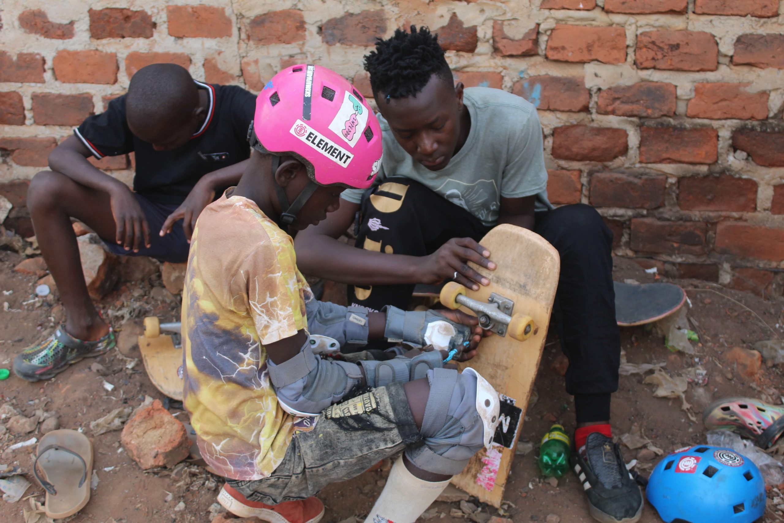 Adidas Donates Pairs Of Shoes To Local Skaters In Uganda 6 Broken Skateboard Uganda Skateboard Society scaled