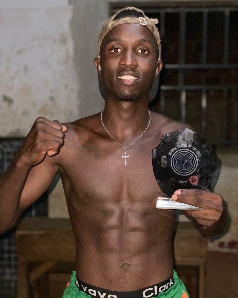 Calvin With The Uganda Skater Of The Year Award